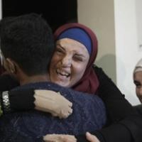 Released Palestinian prisoner embraced by family and friends