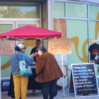 At a Los Angeles farmers market December 10 raising funds for the revolution with anti-Zionist, pro-Palestinian latkes!