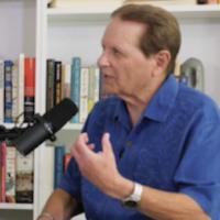 Bob Avakian with microphone