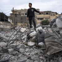 Rafah, Gaza, sole survivor on debris from Israeli airstrike meant to rescue hostages.