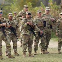 Texas National Guard in camouflage, at the Mexican border