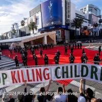 "Stop Killing Children" banner stops traffic at the Oscars, March 10, 2024.