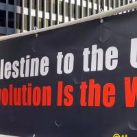 Banner: From Palestin to the USA, Real Revolution Is the Way