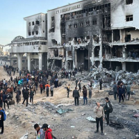 Palestinians search for bodies in the rubble at Al-Shifa Hospital earlier in April, 2024.