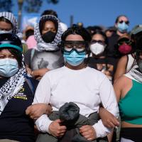 Pro-Palestinian demonstrators form a human chain on the UCLA campus, Los Angeles, May 1, 2024.