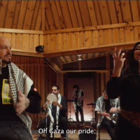 Residente and the Palestinian singer Amal Murkus, “Bajo los escombros” (“Under The Rubble”) [screengrab from YouTube]