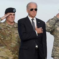 Genocide Joe Biden when he was Vice President with Army Chief of Staff Gen. Mark Milley, Vice President Joe Biden at Dover Air Force Base, Del in 2016.