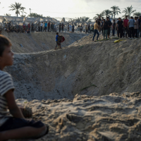 2,000-Pound bombs supplied by the U.S. made this crater at Al-Mawasi refugee tent camp in Gaza. The Israeli strike killed at least 40 people and wounded 60, September 10, 2024.