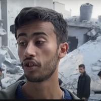 Man looking at destruction in north Gaza