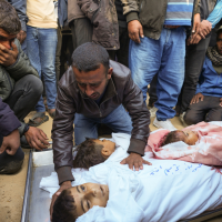 Father mourns his three children killed by Israeli airstrike in Khan Younis, Gaza, November 21, 2024.