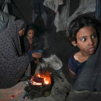 Family displaced from northern Gaza, in their tent in Deir al-Balah, November 30, 2024.