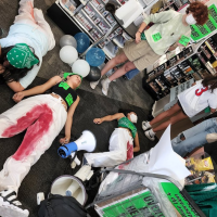 Bloody pants die-in disrupting business as usual for abortion rights. This kind of simple disruptive action can and should be done NOW, including by people who are very new to this.