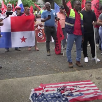 In Panama protestors burn U.S. flag on January 20, outraged at Trumps threats to take over the Panama Canal.