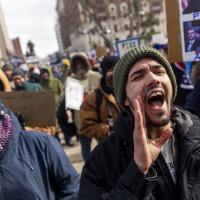 Lansing, Michigan, February 17, 2025, protest, guy chanting.