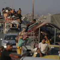 Displaced Palestinians flee the northern Gaza Strip, August 30, 2025.