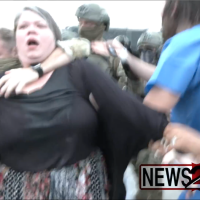 Screengrab from News2Share of protest at ICE center