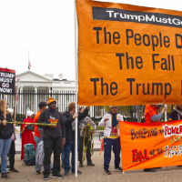 This past Saturday Refuse Fascism, working with others, marshaled over 250 people to surround the White House with yellow crime tape.