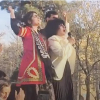 Leading crowd in chants at the 7th-day memorial