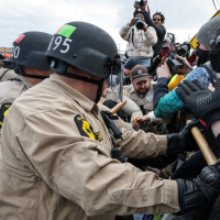 Cops push protesters at ICE detention center, Broadview, IL, November 1, 2025.