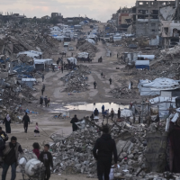 Palestinians return to destroyed buildings in the northern Gaza Strip, January 2, 2026.