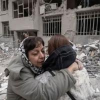 Iran - two women after bombing by U.S.
