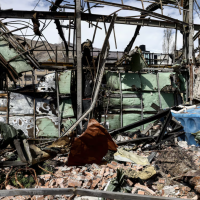 Screen shot of Iran war destruction from refusefascism.org