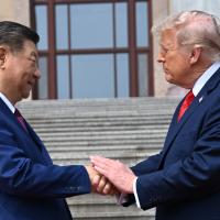 Chinese President Xi Jinping shakes hands with U.S. President Donald Trump in Beijing, May 14, 2026.