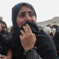 At a mass funeral for people killed when a U.S. strike hit a wedding party in southern Iran, September 3, 2026.