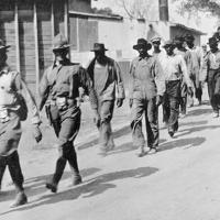 2-USArmy-march-Black-Farmers-ElaineAK-Oct1919-PH-AKStateArchives-600px.jpg