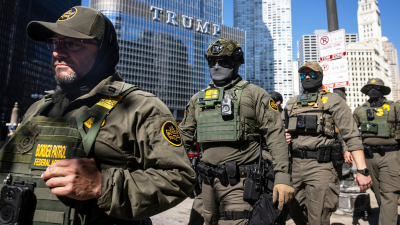 Federal agents from ICE and Border patrol in the Loop in Chicago, Sept. 28, 2025