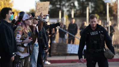 Protesters rally against federal troops in Oakland, California, October 23, 2025.