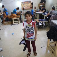 Syrian refugees including children in Turkey sweatshop.