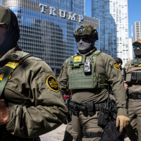 Federal agents from ICE and Border patrol in the Loop in Chicago, Sept. 28, 2025